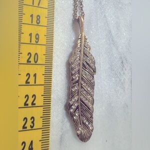 Beautiful ladies fashion necklace lovely large feather and diamanté pendant